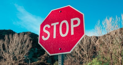 Red and white stop sign
